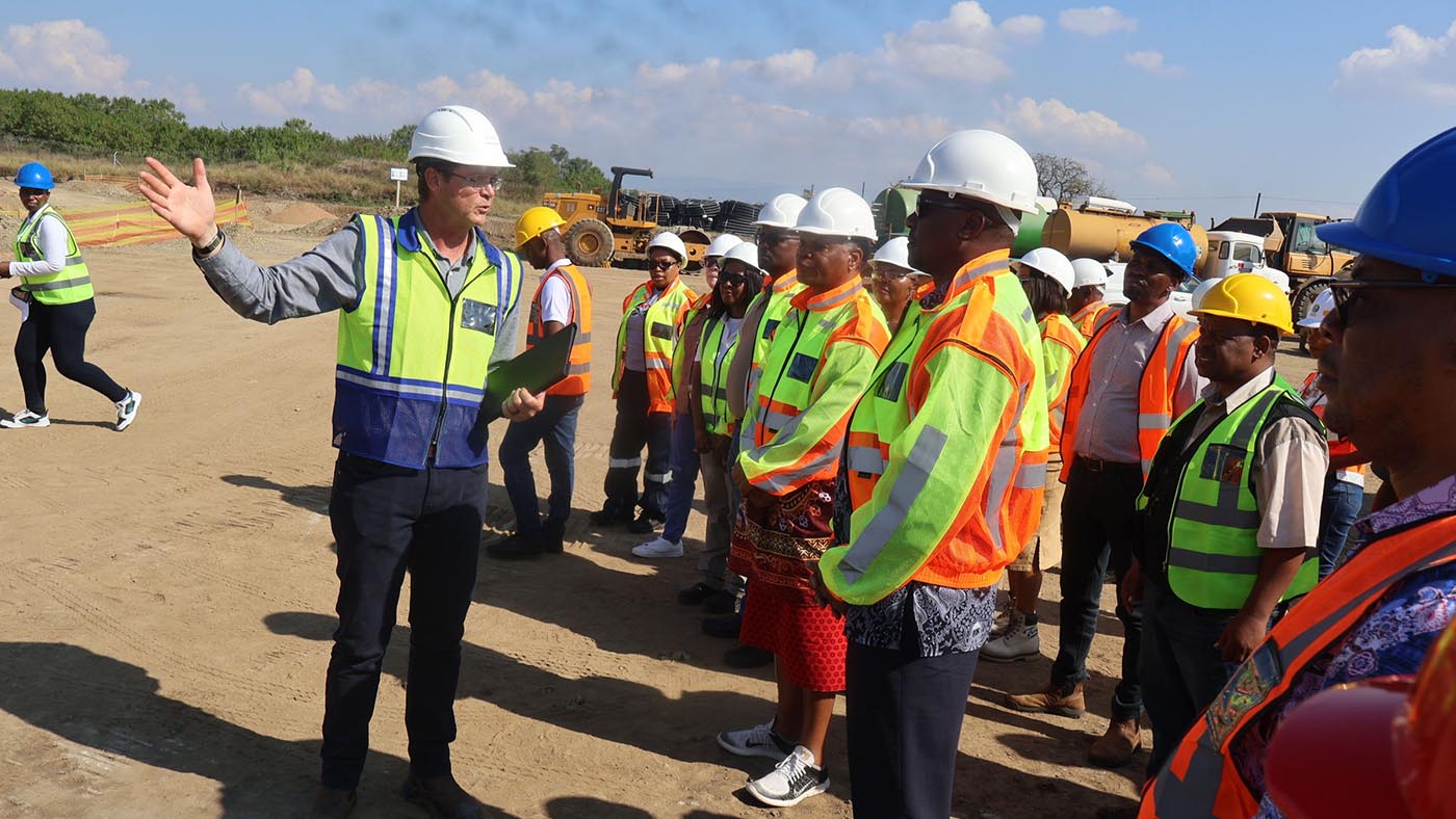 The Prime Minister Russell Mmiso Dlamini listens as he is led through the tour by Project Manager Haness Kleynhaus.